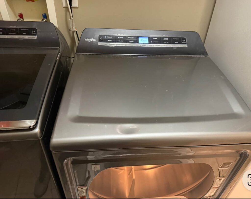 A washer and dryer set displayed together, common appliances in need of repair or maintenance.