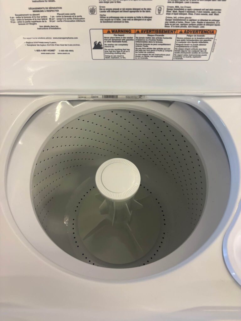 Close-up view of a washing machine drum, highlighting the interior where clothes are washed. A common area needing repair or maintenance.